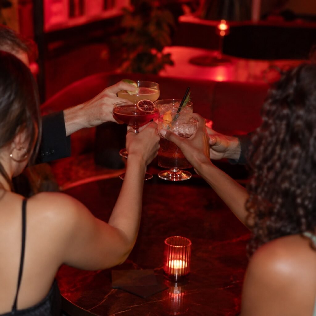 Friends toasting drinks